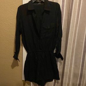 The Fifth Label - Black long sleeve mini romper with pockets; extra button